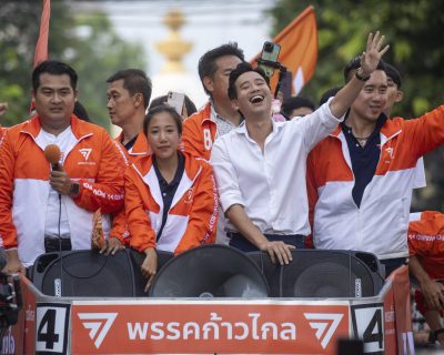 Pita Limjaroenrat, center, (white shirt) leader of Move Forward Party, waves to his supporters, in Bangkok, Monday, May 15, 2023. Fresh off a stunning election victory in which they together captured a majority of seats in the House of Representatives, Thailand's top two opposition parties began planning Monday for the next stage in their bid to replace the military-dominated government. (AP Photo/Wason Wanichakorn)/2023-05-15 21:53:02/
